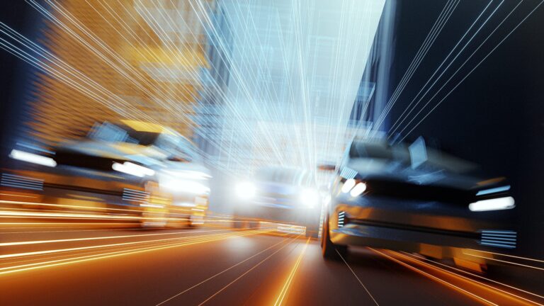 Vehicles in motion, representing ISO 26262 training and automotive safety.