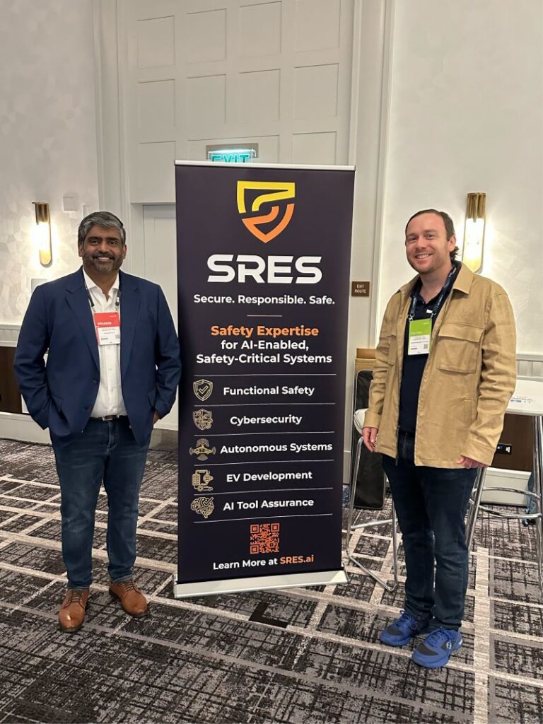 SRES Managing Partner Gokul Krithivasan and Marketing Manager Alex Dow at the SafeAD conference in front of the SRES booth in San Francisco.